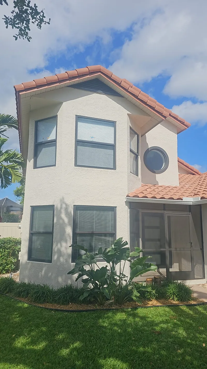 Home exterior after professional repainting — Deerfield Beach, FL